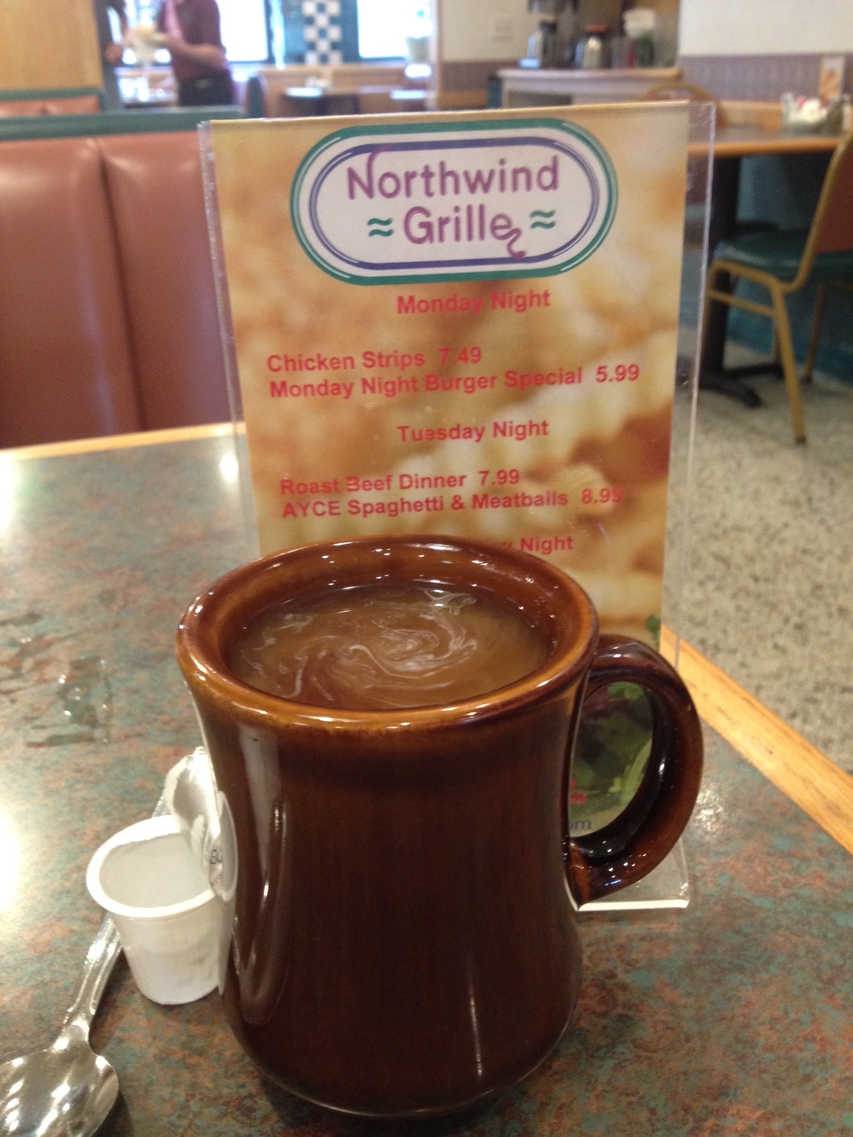 Photo showing a delicious cup of hot, decaf coffee